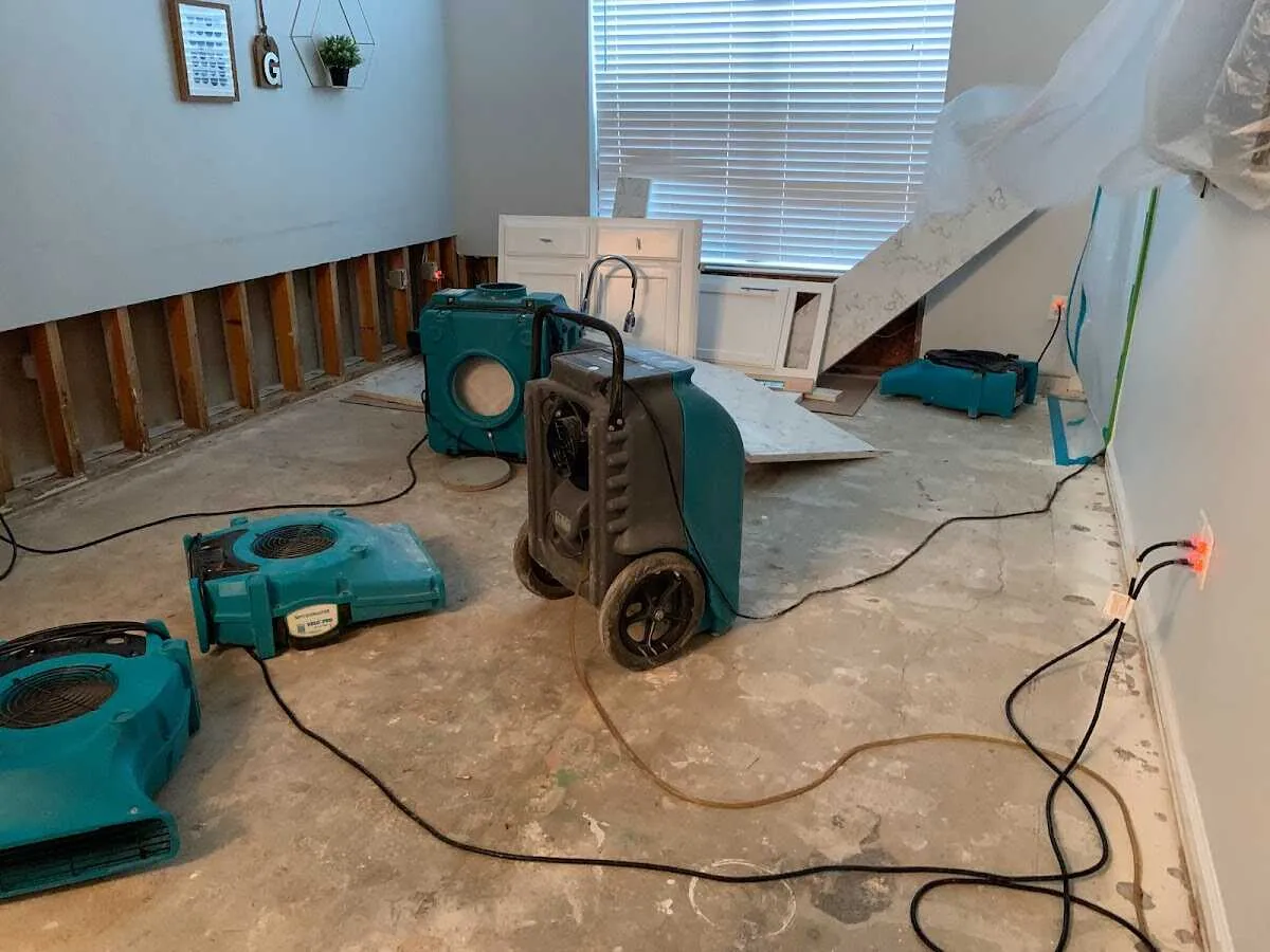 Dehumidifier in flood-cut room for Water Damage Restoration in Highland Heights